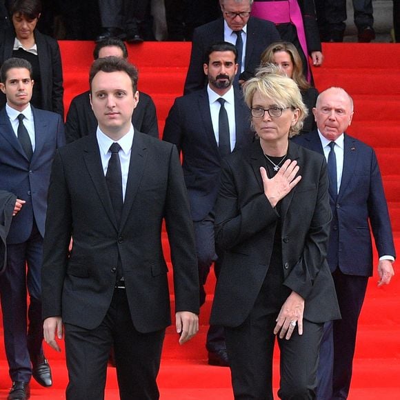 Claude Chirac entourée de son fils Martin Rey-Chirac lors de la cérémonie funéraire de l'ancien président français Jacques Chirac qui s'est tenue à l'église Saint-Sulpice à Paris, en France, le 30 septembre 2019. Photo Christian Liewig/Abaca