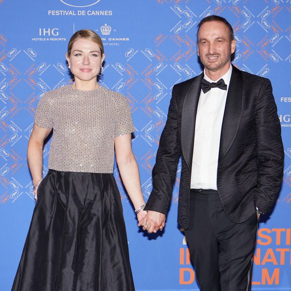 Emilie Dequenne et son mari Michel Ferracci - Photocall du dîner d'ouverture du 76ème Festival International du Film de Cannes, au Carlton. Le 16 mai 2023
© Borde-Jacovides-Moreau / Bestimage
