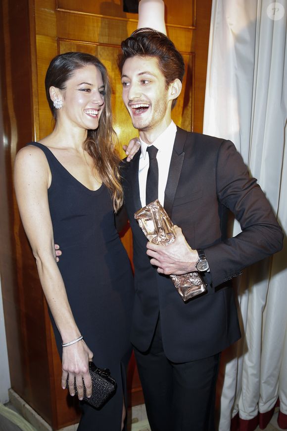 Natasha Andrews (Bijoux Van Cleef) et son compagnon Pierre Niney, César du meilleur acteur dans Yves Saint Laurent en Costume Dior, montre Montblanc - Dîner au Fouquet's lors de la 40ème cérémonie des César à Paris le 20 février 2015. © BORDE-JACOVIDES / BESTIMAGE
