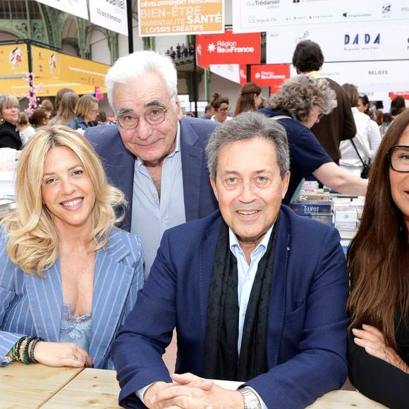 Georges Fenech avec sa compagne Marie Severine Trouban, Nathalie Marquay Pernaut et Guy Tredaniel - Festival du Livre de Paris 2025 au Grand Palais à Paris le 12 avril 2025.
© Cédric Perrin / Bestimage