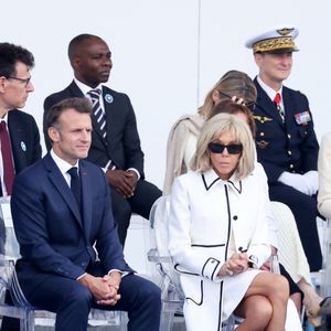 le président Emmanuel Macron, Brigitte Macron - Cérémonie du 145ème défilé militaire du 14 juillet, jour de la Fête Nationale, avenue des Champs-Elysées à Paris.
© Dominique Jacovides / Bestimage