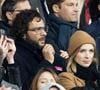 Et pour bien déconnecter, l'animatrice a quitté la France en famille, avec sa fille Mia qu'elle a eue avec l'artiste Maxim Nucci.
Maxim Nucci (Yodelice) et sa compagne Isabelle Ithurburu dans les tribunes lors du match de rugby du Tournoi des 6 Nations opposant la France à l'Angleterre au stade de France, à Saint-Denis, Seine Saint-Denis, France, le 19 mars 2022. © Cyril Moreau/Bestimage