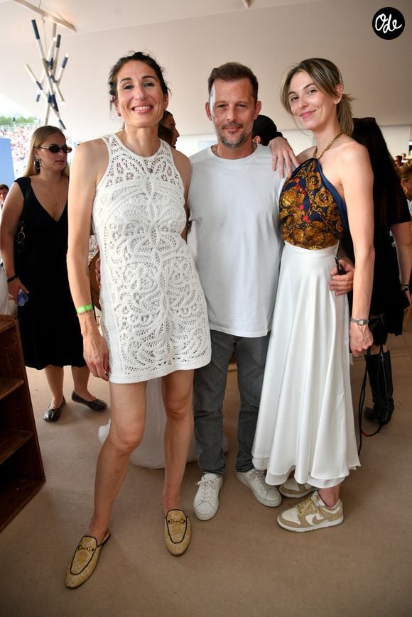 Exclusif - Bathilde Lorenzetti, la Vice-Présidente de Paris La Défense Arena, Nicolas Duvauchelle et sa femme Chloé Roy dans l’espace VIP “le Pavillon Eiffel,” lors de la 12ème édition Longines Paris Eiffel Jumping au pied de la Tour Eiffel sur le Champ-de-Mars à Paris, France le 20 juin 2026.
© Perusseau / Veeren / Bestimage