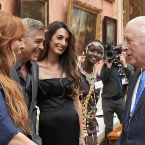 Le couple a rencontré le roi Charles III, à l'initiative de l'événement dans le but de venir en aide aux jeunes dans le besoin

George Clooney et Amal Clooney lors de la réception en l'honneur des lauréats des King's Trust Awards au palais de Buckingham le 25 juin 2025  Stefan Rousseau/WPA-Pool/Bestimage