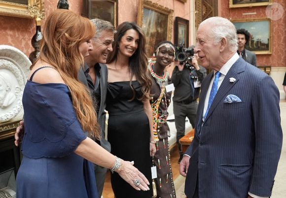 Le couple a rencontré le roi Charles III, à l'initiative de l'événement dans le but de venir en aide aux jeunes dans le besoin

George Clooney et Amal Clooney lors de la réception en l'honneur des lauréats des King's Trust Awards au palais de Buckingham le 25 juin 2025  Stefan Rousseau/WPA-Pool/Bestimage