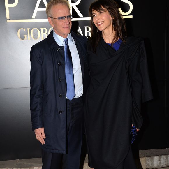 Sophie Marceau et son compagnon Christophe Lambert - Arrivee des people au defile Giorgio Armani Haute Couture Printemps/Ete 2014 au Palais de Tokyo a Paris, le 21 janvier 2014.