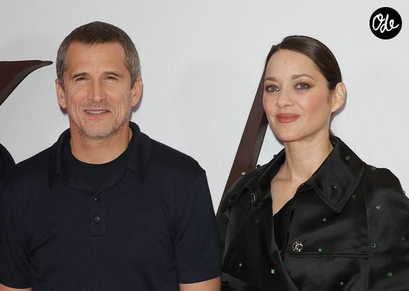 Guillaume Canet (réalisateur du film "Karma") et Marion Cotillard au photocall de la première du film "Karma" au cinéma Pathé Palace à Paris le 13 octobre 2026. © Coadic Guirec / Bestimage