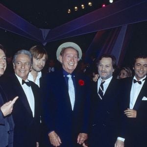 Photos de Pascal Sevran, Guy Lux, Renaud, Charles Trenet, Jean-Jacques Debout, Bernard Montiel, Patrick Sebastien et Sylvie Vartan réunis pour une émission de télévision en l'honneur de Charles Trenet à Paris, France. Photo by Pascal Baril/ABACAPRESS.COM