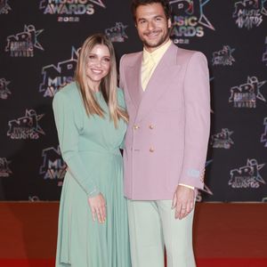 Amir Haddad et sa femme Lital au photocall de la 24ème édition des "NRJ Music Awards (NMA)" au Palais des Festivals à Cannes le 18 novembre 2022. © Christophe Aubert via Bestimage