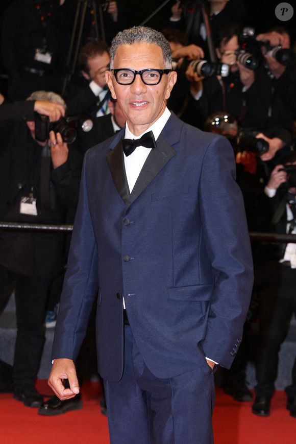 Roschdy Zem assiste au tapis rouge de "13 Jours 13 Nuits" lors du 78ème Festival de Cannes au Palais des Festivals le 23 mai 2025 à Cannes, France. Photo by Jerome Domine/ABACAPRESS.COM