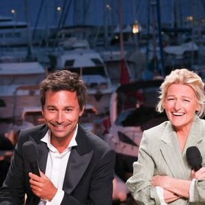 Il faut dire que la complice de Bertrand Chameroy à l'écran a épousé en 2012 un homme qui s'épanouit dans un monde diamétralement opposé au sien...

Bertrand Chameroy et Anne-Élisabeth Lemoine sur le plateau de l'émission "C à vous" lors du 79ème Festival International du Film de Cannes le 14 mai 2026. Crédit Jack Tribeca / Bestimage