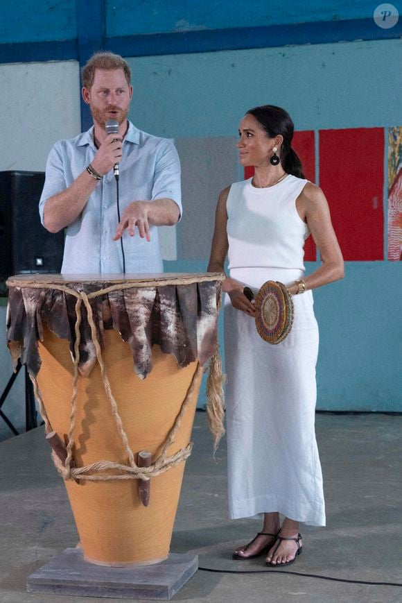 Le prince Harry et la duchesse de Sussex Meghan lors d'une visite à San Basilio de Palenque, en Colombie, le 17 août 2024.