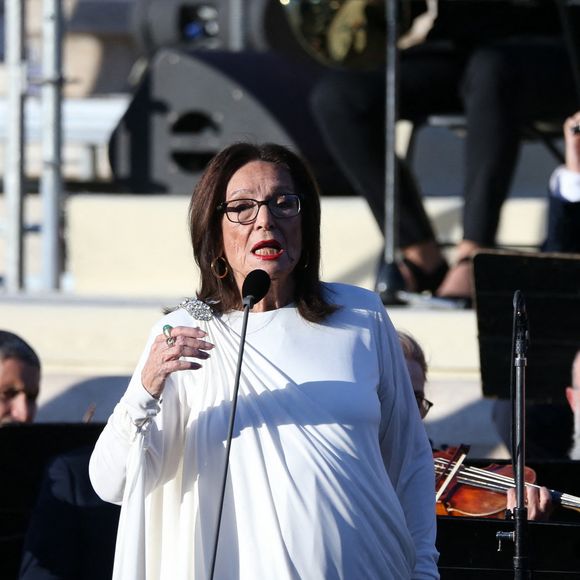 Elle peut dire merci à Netflix !

Nana Mouskouri chante les hymnes français et grec lors du relai de la flamme olympique le 24 avril 2024 à Athènes, Grèce. © Aristidis Vafeiadakis/ZUMA Press/Bestimage