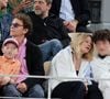 Le chanteur Raphaël, sa compagne Mélanie Thierry et leurs enfants Roman et Aliocha Haroche - Les célébrités dans les tribunes des Internationaux de France de tennis de Roland Garros 2024 à Paris, le 29 mai 2024.  © Jacovides / Moreau / Bestimage
