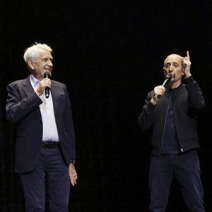 Exclusif - Gad Elmaleh célèbre les cinquante ans de carrière de Gilbert Coullier sur la scène du Zenith de Rouen à la fin de son spectacle "Lui même" 
Le 28 mars 2025. © Jack Tribeca / Bestimage