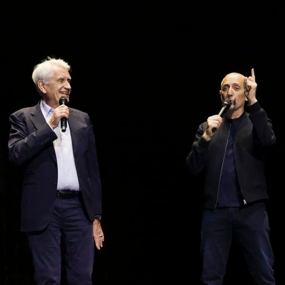 Exclusif - Gad Elmaleh célèbre les cinquante ans de carrière de Gilbert Coullier sur la scène du Zenith de Rouen à la fin de son spectacle "Lui même" 
Le 28 mars 2025. © Jack Tribeca / Bestimage