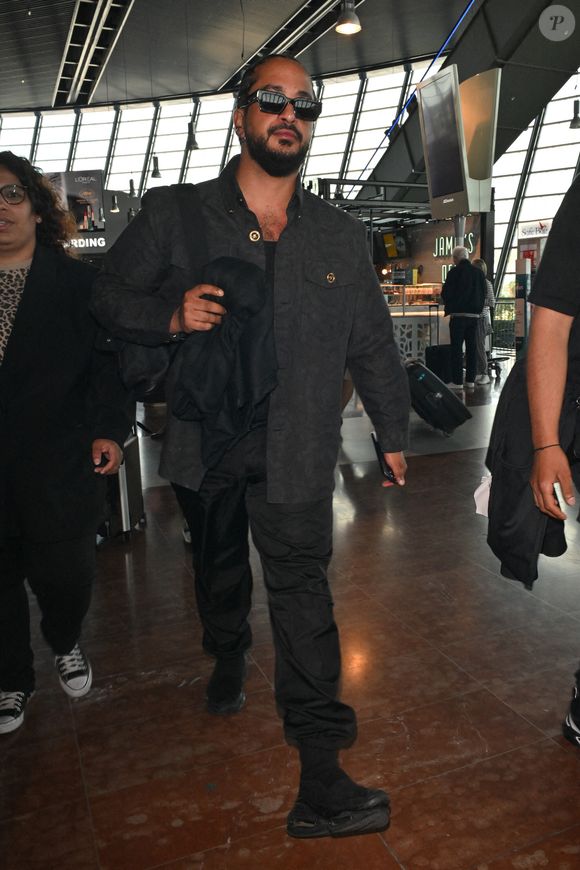 Slimane à l'aéroport de Nice avant le 77e Festival de Cannes à Nice, France, le 19 mai 2024.