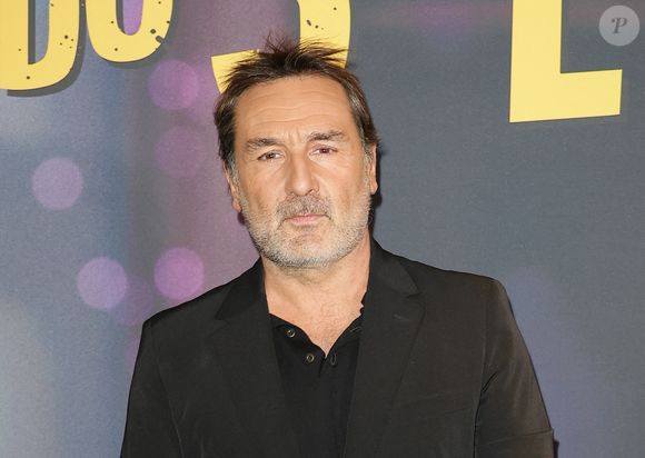 Gilles Lellouche n'a pas aimé la longue improvisation de Raphaël Quenard sur le tournage du film "L'amour ouf".

Gilles Lellouche - Avant-première du film "Le Crime du 3e étage" au cinéma Pathé Wepler à Paris le 9 mars 2026. © Coadic Guirec/Bestimage