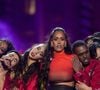 Mais plutôt que de céder à la colère, la chanteuse a cherché à comprendre ce qui l'entourait. Elle voulait qu'on lui explique, elle voulait “comprendre le monde. 

Amel Bent lors de l'enregistrement de l'émission "La Grande soirée du 31 de Paris", diffusée le 31 décembre sur France 2 © Guebey-Tribeca/Bestimage