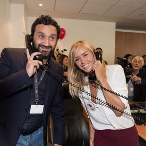 Cyril Hanouna et Enora Malagré - 11ème édition du "BGC Charity Day" à Paris le 11 septembre 2015 en mémoire aux 658 collaborateurs du groupe BGC partners (leader mondial du courtage interbancaire) disparus il y a 14 ans dans les attentats du World Trade Center le 11 septembre 2001.