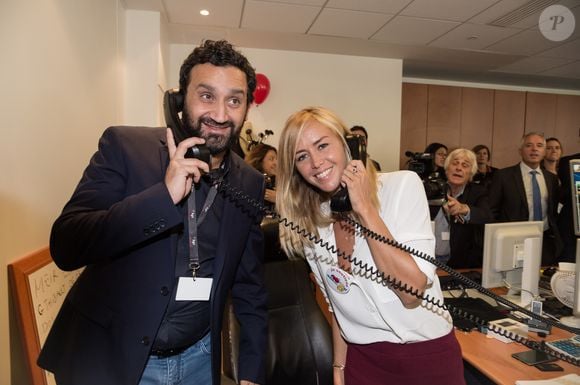 Cyril Hanouna et Enora Malagré - 11ème édition du "BGC Charity Day" à Paris le 11 septembre 2015 en mémoire aux 658 collaborateurs du groupe BGC partners (leader mondial du courtage interbancaire) disparus il y a 14 ans dans les attentats du World Trade Center le 11 septembre 2001.