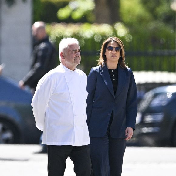 Le chef Guy Savoy et Sonia Mabrouk - Obsèques d'Antoine Alléno (fils du chef cuisinier français, trois étoiles au Guide Michelin Yannick Alléno) en la collégiale Notre-Dame de Poissy, France, le 13 mai 2022. © Jean-Baptiste Autissier/Panoramic/Bestimage