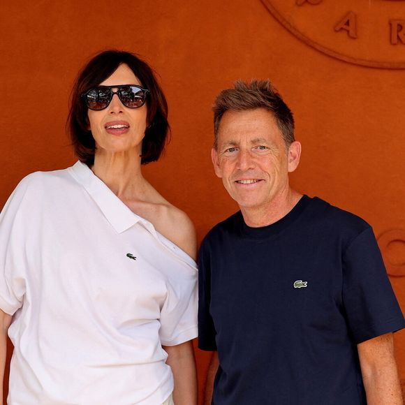 Preuve que la compétition peut aussi être un pretexte pour une sortie en amoureux 

Géraldine Maillet et Daniel Riolo au photocall du village lors des Internationaux de France de Tennis de Roland Garros 2026, à Paris, France, le 30 mai 2026. © Dominique Jacovides/Bestimage



Photocall au village lors des Internationaux de France de Tennis de Roland Garros 2026, à Paris, France, le 30 mai 2026.
