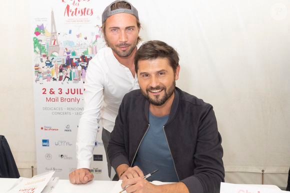 Exclusif - Ghislain Gerin et son mari Christophe Beaugrand - Festival des Livres et des Artistes organisé par l'association "Lecture pour Tous" engagée dans la lutte contre l'illettrisme au Mail Branly à Paris le2 juillet 2022.
© Pierre Perusseau/ Jack Tribeca / Bestimage