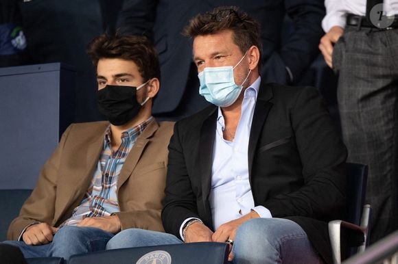 Benjamin Castaldi et son fils Julien Castaldi lors du match de Ligue 1 entre le Paris Saint Germain et l'Olympique de Marseille au Parc des Princes le 13 septembre 2020 à Paris, France. Le PSG s'est incliné 0-1. Photo by David Niviere/ABACAPRESS.COM