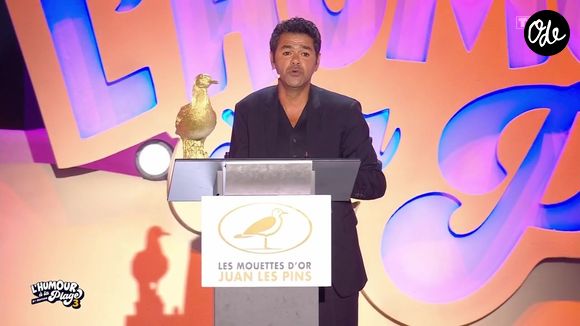 Jamel Debbouze lors de la troisième édition du Festival "L'humour à la plage" diffusée sur TF1 jeudi 27 août 2026

Capture d'écran TF1 "L'humour à la plage"