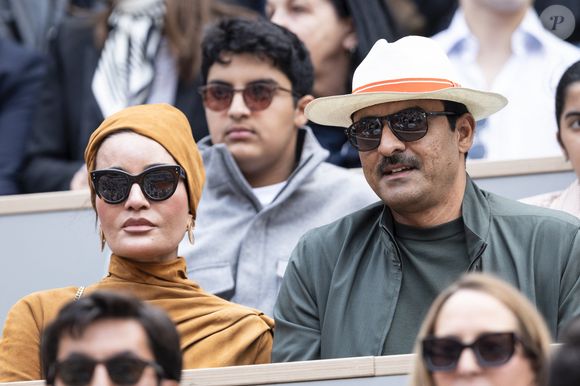 L'Émir du Qatar Cheikh Tamim bin Hamad bin Khalifa Al Thani et Cheikha Hind bint Hamad bin Khalifa al-Thani en tribunes lors de la finale messieurs des Internationaux de France de Tennis de Roland Garros 2025 (jour 15), à Paris, France, le 8 juin 2025. © Cyril Moreau/Bestimage