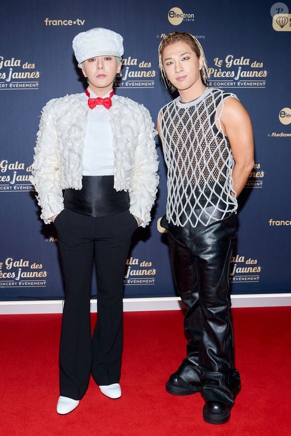 Exclusif - G Dragon et Taeyang au photocall du "Gala des pièces jaunes, le concert événement" à La Défense Arena à Nanterre le 23 janvier 2025. Le gala des Pièces Jaunes 2025 sera diffusé le 28 janvier, sur France 2 et sur la plateforme France.Tv.

© Jacovides / Moreau / Bestimage