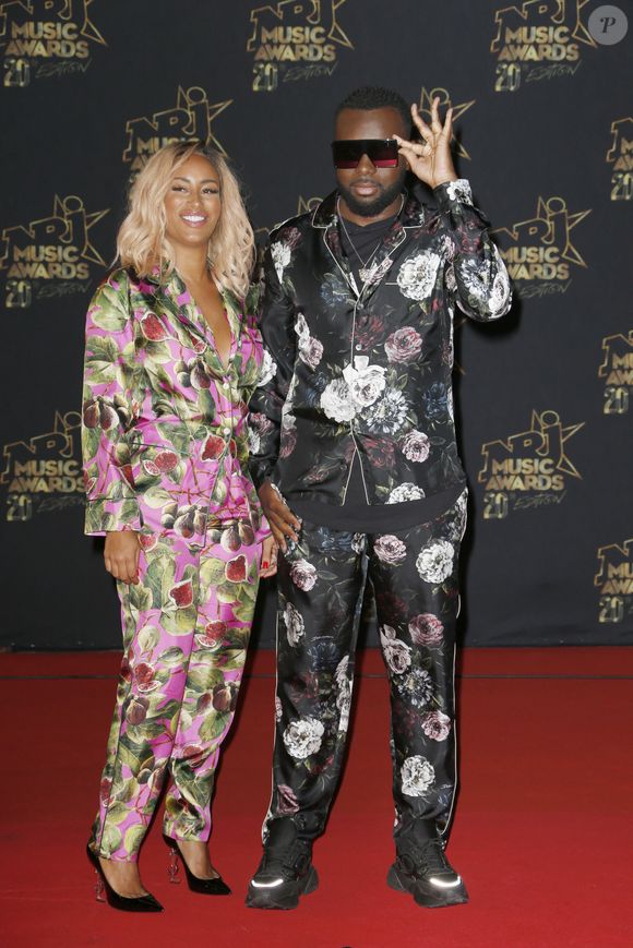 Le couple avait tourné ensemble dans le clip "Tout donner", façon Bonnie & Clyde de Gims, en 2016.

Demdem, Maitre Gims - 20ème cérémonie des NRJ Music Awards au Palais des Festivals à Cannes. Le 10 novembre 2018 © Christophe Aubert via Bestimage