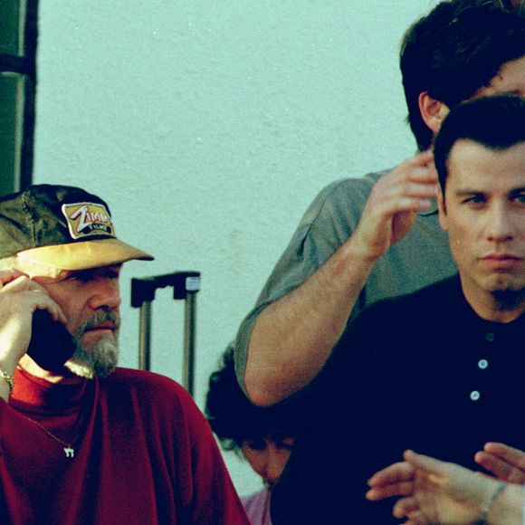 John Travolta et Gene Hackman sur le tournage de "Get Short" Sunset - Boulevard à Los Angeles - dans une voiture. 1995 (NIZON / BESTIMAGE).