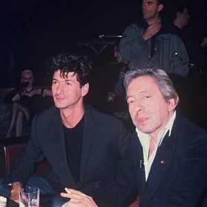 Archives - Serge Gainsbourg et Etienne Daho lors d'une soirée au Palace à Paris en 1989. (AGENCE / BESTIMAGE).
