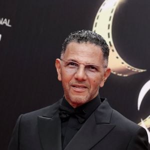 Roschdy Zem au photocall de la soirée d'anniversaire pour les 20 ans du Festival International du Film de Marrakech, Maroc, le 25 novembre 2023. © Dominique Jacovides/Bestimage