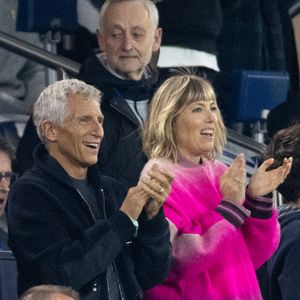 Nagui et Melanie Page dans les tribunes du match de football de qualification pour la coupe du monde 2026 opposant la France à Azerbaïdjan (3-0) au Parc des Princes à Paris, France, le 10 octobre 2025. © Cyril Moreau/Bestimage