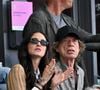 Depuis 2014, le leader des Rolling Stones file le parfait amour avec la chorégraphe américaine Melanie Hamrick qui publiera prochainement son 3ème roman.

Mick Jagger et sa compagne Melanie Hamrick assistent aux épreuves d'athlétisme lors des Jeux Olympiques de Paris2024 (JO), le 8 août 2024.  © Perusseau-Jacovides / Bestimage