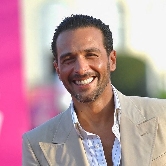 Malgré leurs 14 ans d’écart, ils partagent un lien fraternel fort et naturel. 

Maxim Nucci assiste à la cérémonie de clôture du 49ème Festival du Cinéma Américain de Deauville. Photo par Franck Castel/ABACAPRESS.COM