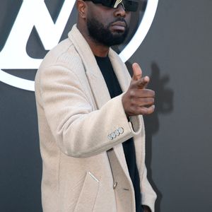 Gims - Célébrités au Défilé Louis Vuitton, Collection Prêt-à-porter Printemps / Eté 2025 dans le cadre de la Fashion Week de Paris, France, le 1er Octobre 2024. 

© Bertrand Rindoff / Bestimage