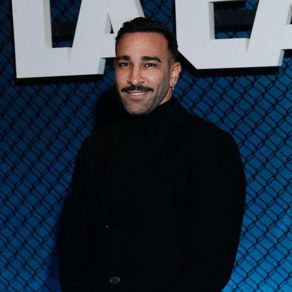 Lorsqu'on lui demande s’il sera accompagné de sa nouvelle amoureuse, ce dernier répond : “Je pense”

Adil Rami - Avant-première de la série "La cage" se déroulant dans le monde du MMA réalisée par F. Gastambide avec l'aide de D. Krespine qui sera diffusée sur Netfilx à partir du 8 novembre 2024 au Cinéma Pathé Palace à Paris le 4 novembre 2024. © Christophe Clovis / Bestimage