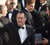 Aujourd’hui figure incontournable du cinéma français, Jean Reno s’est imposé au fil des décennies avec des films marquants comme Léon, Les Visiteurs, mais aussi à l’international avec des productions telles que Godzilla ou Mission : Impossible. 

Jean Reno et sa femme Zofia Borucka à la montée des marches du film "The Last Face" lors du 69ème Festival International du Film de Cannes le 20 mai 2016. © Lionel Urman / Bestimage