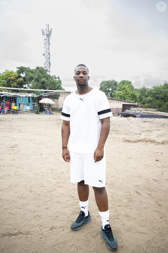 Exclusif - SDM, de son vrai nom Beni Mosabu - Les célébrités jouent pour les enfants déplacés de Goma dans le stade de Bandal quartier populaire de Kinshasa, République Démocratique du Congo, le 3 décembre 2024. © Pierre Perusseau/Bestimage