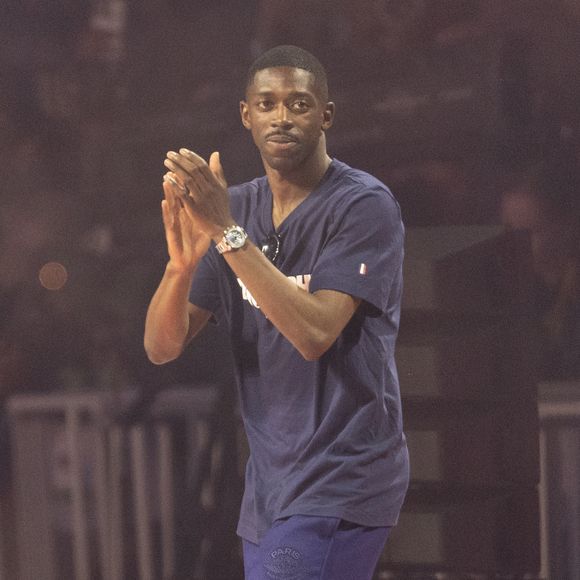 En quoi consiste celui-ci ?

Ousmane Dembélé - Les joueurs du PSG célèbrent leur titre de Champion d'Europe au Parc Des Princes à Paris, le 1er juin 2025.
© Cyril Moreau/Bestimage