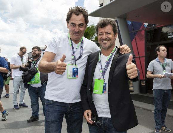 Eric Carrière, Francis Ginibre (Les chevaliers du fiel) posent dans la zone des paddocks lors duF1 Grand Prix de France, Le Castellet le 24 juin 2018. Photo par Marco Piovanotto/ABACAPRESS.COM