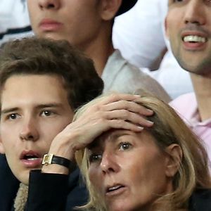 Exclusif - Claire Chazal avec son fils François Poivre d'Arvor et un ami le banquier Christophe de Backer assistent au quart finale de la Ligue des Champions de football au Parc des Princes entre le PSG et le FC Barcelone à Paris le 15 avril 2015.