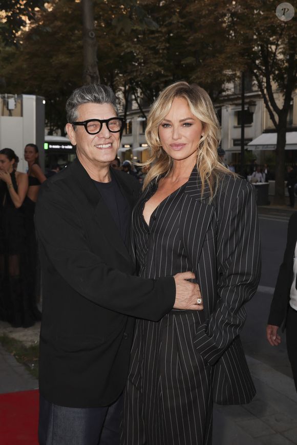 Marc Lavoine et sa compagne Adriana Karembeu arrivant au "Concerto pour la Paix" organisé par Omar Harfouch au Théâtre des Champs Élysées à Paris, France, le 18 Septembre 2024. 
© Perusseau / Tribeca / Bestimage