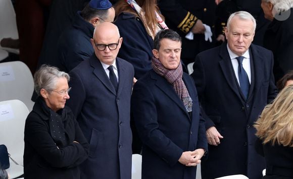 Elisabeth Borne, Edouard Philippe, Manuel Valls, Jean-Marc Ayrault - Cérémonie d’hommage national aux victimes françaises des attaques terroristes du 7 octobre en Israël dans la cour d’honneur de l’Hôtel national des Invalides, à Paris, France, le 7 février 2024. Quatre mois jour pour jour après les attentats terroristes qui ont frappé Israël et le peuple israélien et qui ont causé la mort de 42 de nos concitoyens. A ce jour, trois de nos compatriotes demeurent toujours disparus et présumés otages, et la France n’a de cesse d’œuvrer avec ses partenaires pour leur libération. © Dominique Jacovides/Bestimage