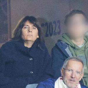 Estelle Denis et son fils Merlin Domenech - People des les tribunes de la coupe du Monde de Rugby France 2023 - Match de quart de finale "France-Afrique du Sud (28-29)" au Stade de France à Saint-Denis 15 octobre 2023. © Moreau-Jacovides/Bestimage