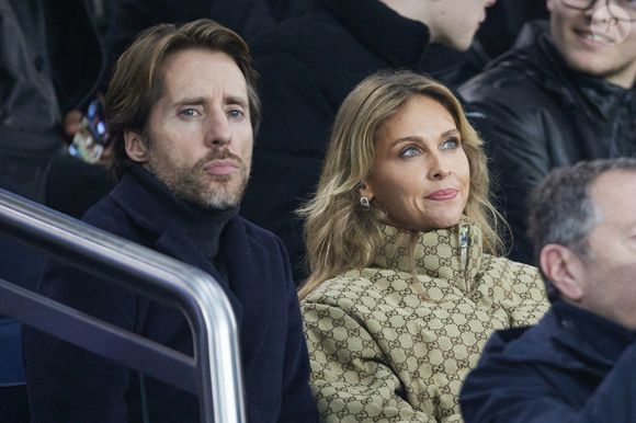Ophélie Meunier et son mari Mathieu Vergne - Célébrités assistent au match de Ligue des champions entre le PSG et Manchester City (4-2) au Parc des Princes à Paris le 22 janvier 2025. © Cyril Moreau/Bestimage